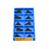 Close-up of a Kyocera TPMT160304GP CA125P turning insert showing the GP chipbreaker design for finishing