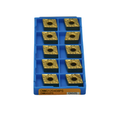 Top-down view of Kyocera CNMG120408PS CA525 turning insert showing precise PS chipbreaker for finishing to medium cuts